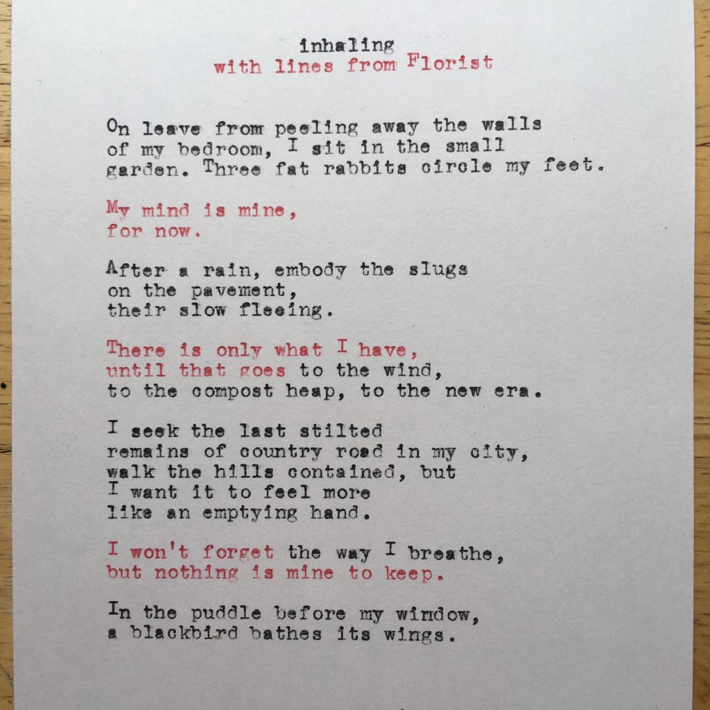 The poem is typed in black and red ink